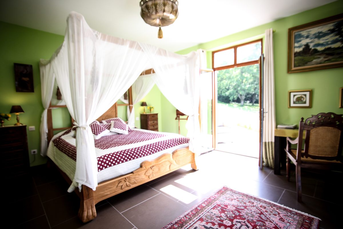 La suite Granny Smith, son lit à baldaquin et ses verts tendres